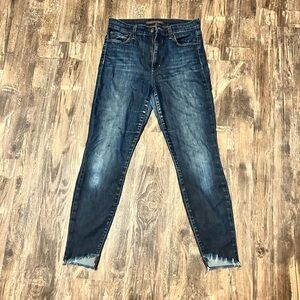 Joe’s skinny jeans with frayed bottoms size 28.
